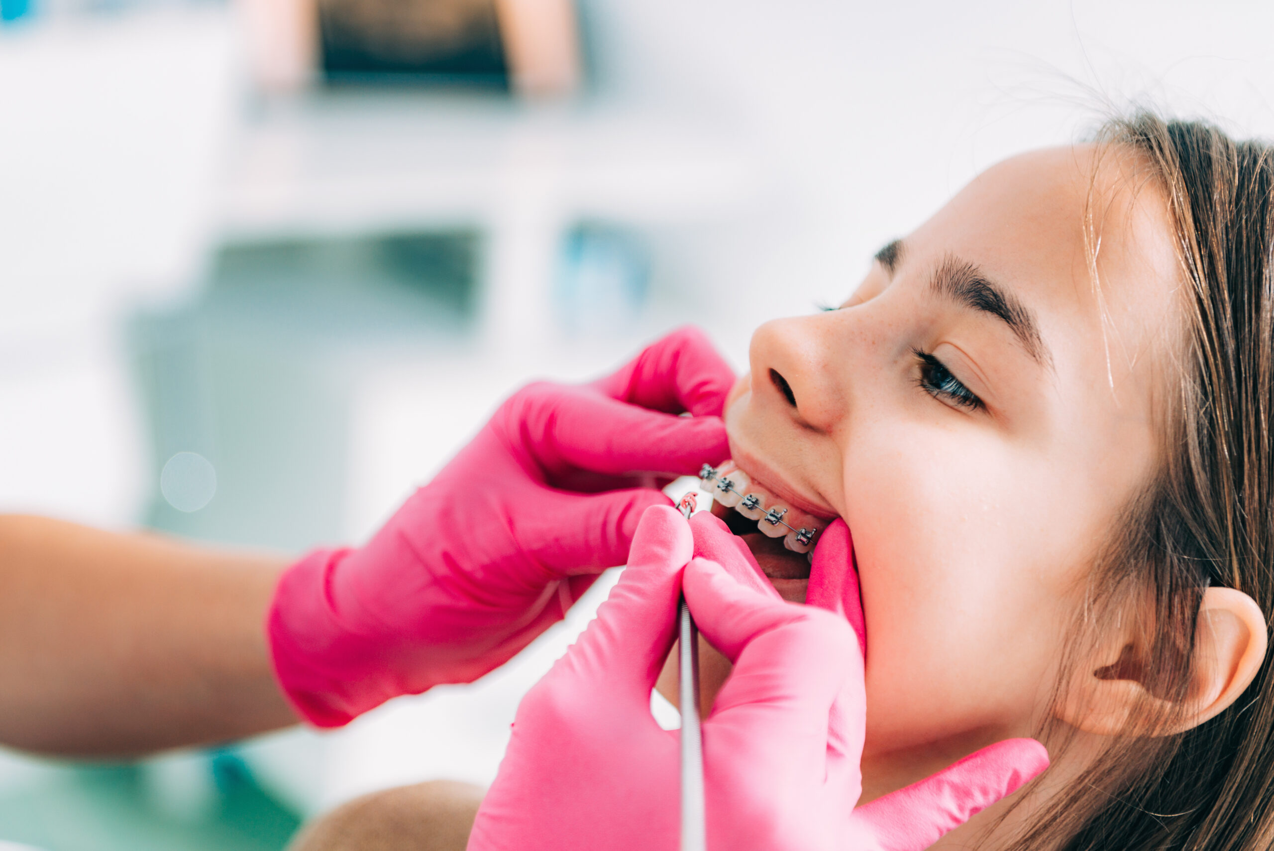 Orthodontist examining little patient in Winnipeg