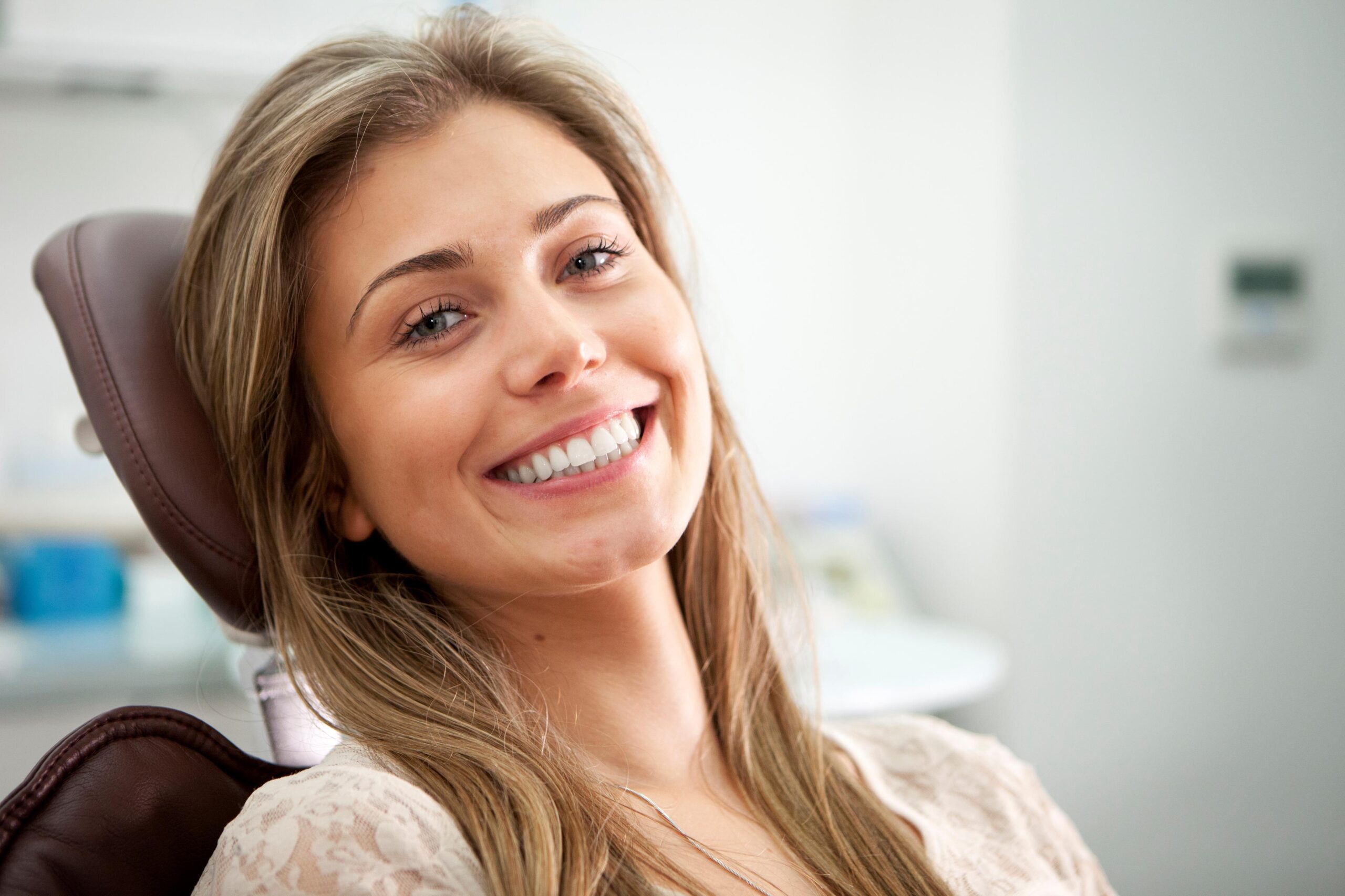 Woman smiling before general dentistry scaled in Winnipeg