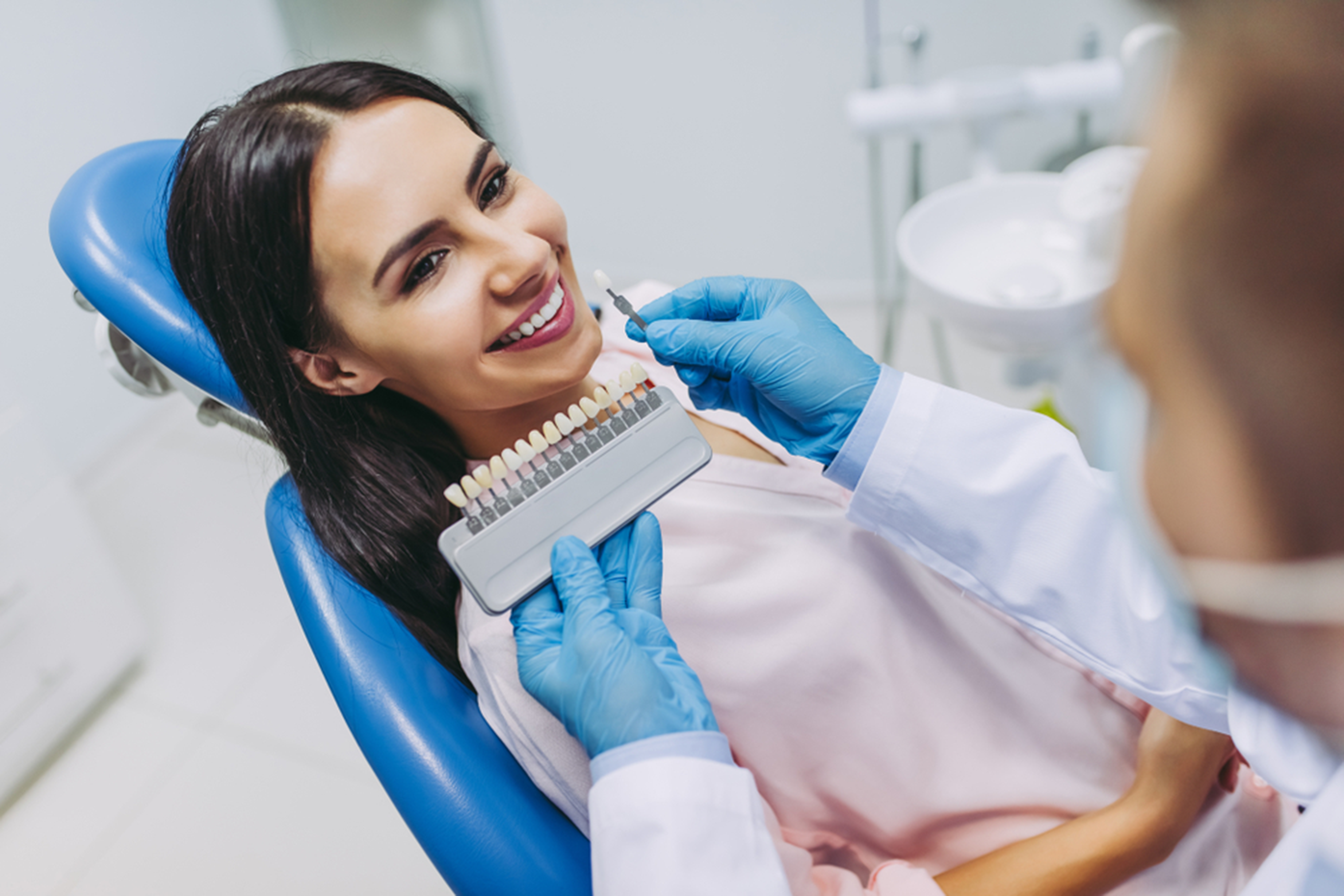 Women getting porcelain veneers in Winnipeg